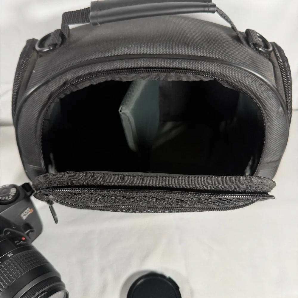 Canon Black Digital Camera with Lens and Strap